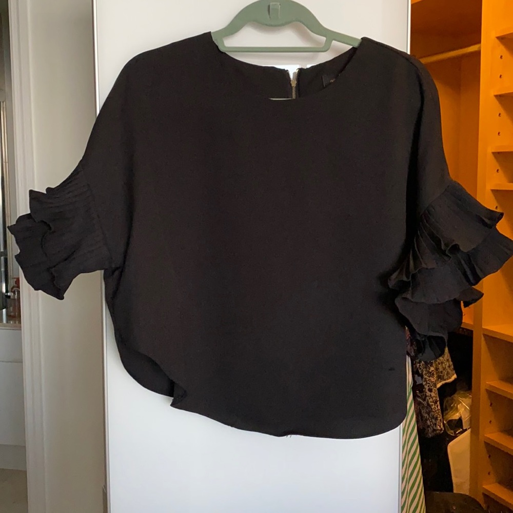 Black top with ruffles